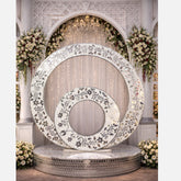 Double round ring mirror event panel set (8 ft & 4.8 ft) with floral cut design, perfect for wedding stage backdrop, entry décor, and DIY event setup. Creates a grand and elegant display.
