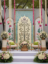 Elegant floral mirror wall panel with intricate silver mirror artwork and decorative blue geometric border detailing.
