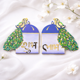 Colorful peacock design Shubh Labh wall hanging with mirror detailing and decorative floral feather artwork for festive home décor.