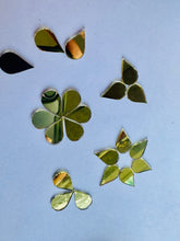 Golden almond shape mirrors for art