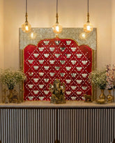Silver mirror backdrop panel with repeating lotus pattern design and decorative arch shape for wedding stage and Lippan art wall décor.