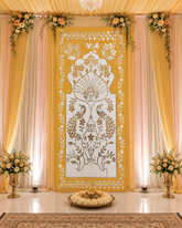 Traditional peacock floral mirror wall panel with elegant silver mirror detailing on a yellow decorative background.