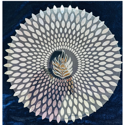 Decorate your space with this 16-inch ready-made mirror rangoli on a transparent sheet that lets the floor colour show through. Comes in 4 parts to arrange together, perfect for entrances, pooja spaces and festive décor. St-100