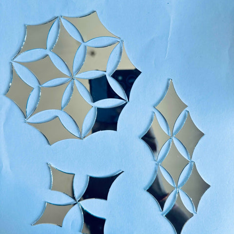 Geometric floral pattern silver mirror pieces with interlocking petal design, ideal for Lippan art, mandala work, mosaic decoration, and creative DIY craft projects