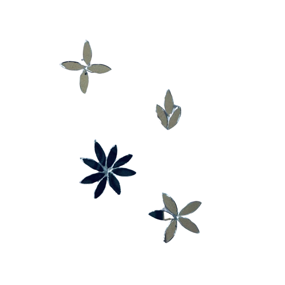 Small floral petal mirror pieces in different shapes, perfect for Lippan art, mandala designs, and DIY craft decoration, ideal for creating flower patterns and detailed mirror work