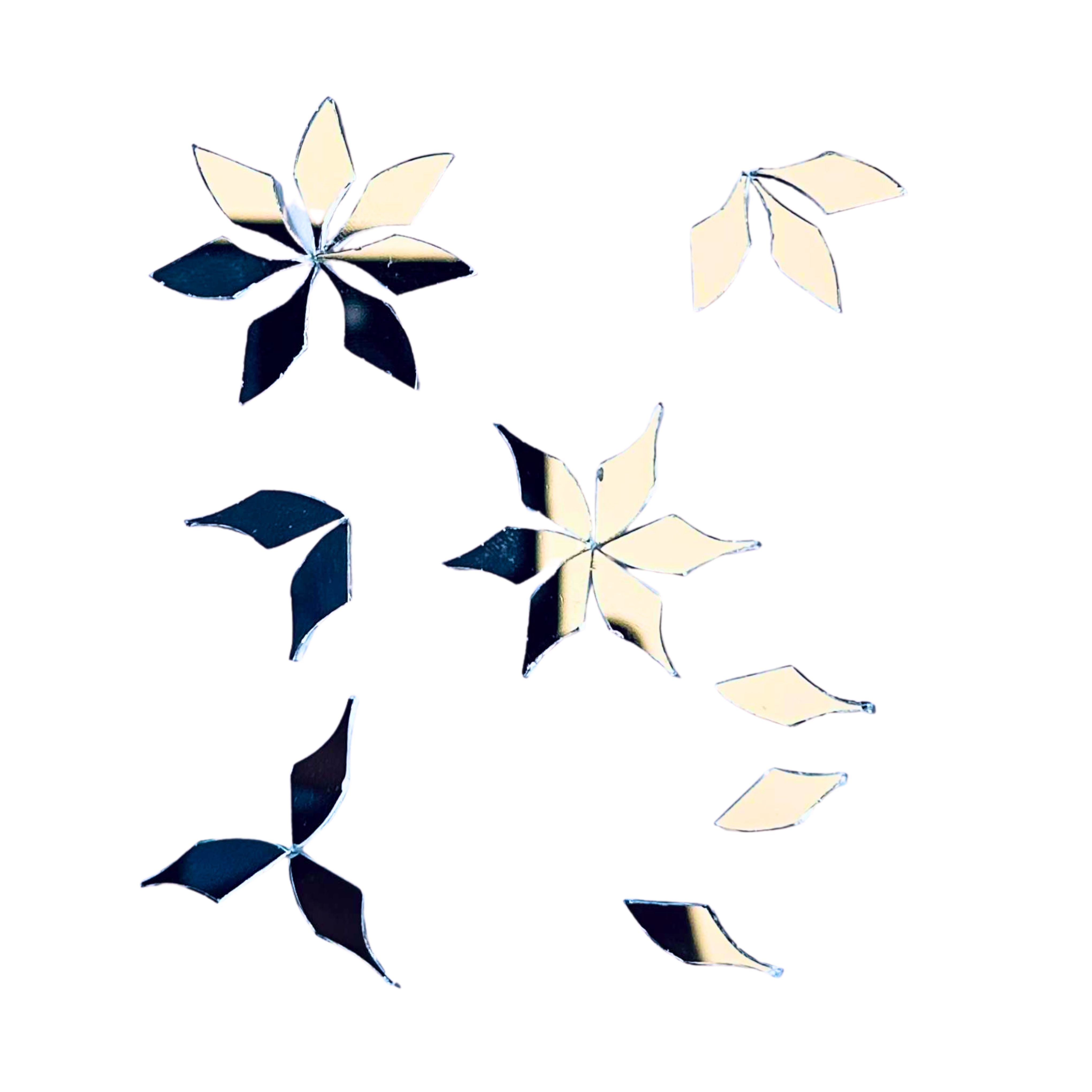 Twisted leaf petal shape mirror pieces arranged in floral and star patterns for Lippan art, mirror work, Mandala art, and DIY craft decoration.