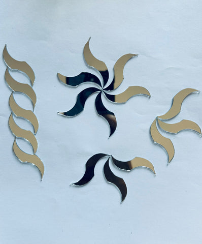 Twisted curved petal shape silver mirror pieces for Lippan art and DIY craft, perfect for spiral patterns, borders, and creative mirror work designs with a smooth reflective finish