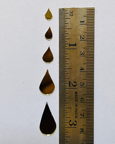 Golden almond shape mirrors for art